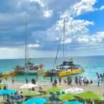7 Mile Beach Party Catamaran Cruise with Snorkeling & Ricks Cafe - Who Should Consider This Tour?