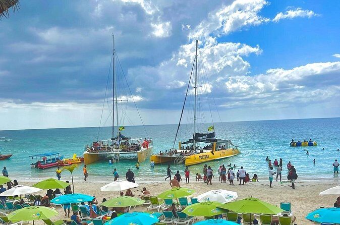 7 Mile Beach Party Catamaran Cruise with Snorkeling & Ricks Cafe - Who Should Consider This Tour?
