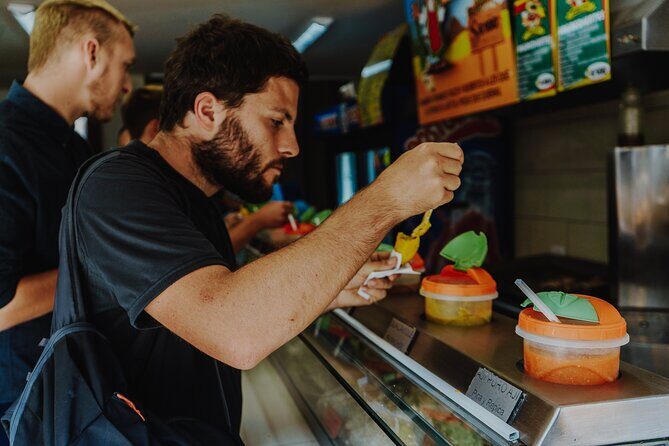 Bogota Shared Gastronomy Tour in the Historic Center - Historic Squares and Market Adventures