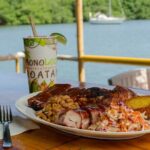 Catamaran Tiki Boat Sunset Snorkeling Dinner Cruise in Roatan - Who Should Consider This Experience?