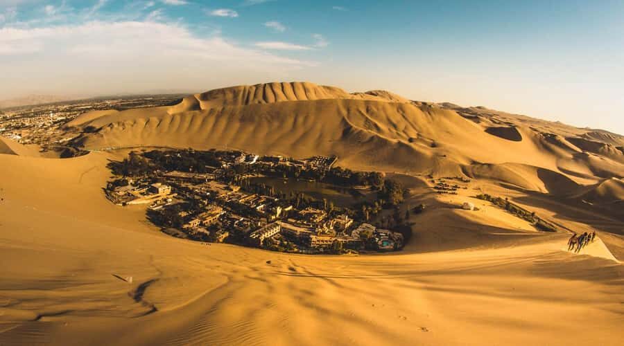 Full day tour to Huacachina and Paracas - Huacachina Oasis: A Surreal Desert Retreat