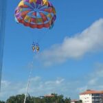 Parasailing above the Caribbean Sea - Why Parasailing in Ambergris Caye is a Must-Do