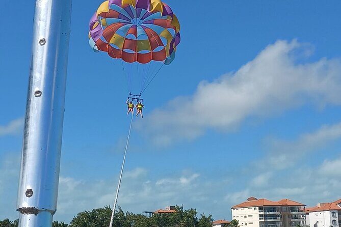 Parasailing above the Caribbean Sea - Why Parasailing in Ambergris Caye is a Must-Do
