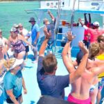 Party boat in Catamaran with Open Bar adults only - The Sum Up