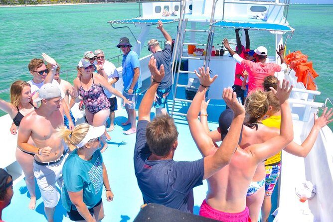 Party boat in Catamaran with Open Bar adults only - The Sum Up