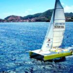Sailing catamaran in La Baie des Saintes - The Sum Up
