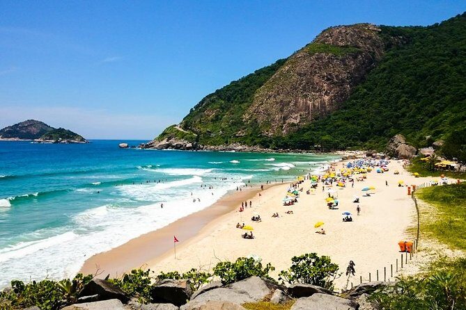 Tour 4 ( 8 hours ) : Sugar Loaf , Botanical Garden , Favela and western beaches - Exploring Rio in a Day: The Itinerary Breakdown