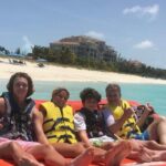 Tubing on grace bay beach Turks and caicos islands - The Value of This Experience