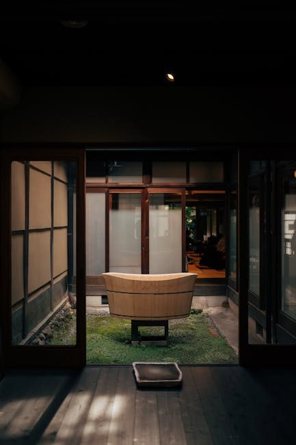 A serene indoor view showcasing a traditional wooden bath tub in a Kyoto house.