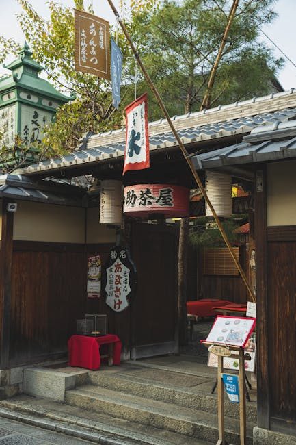 Charming entrance to a traditional wooden teahouse in Kyoto, Japan, showcasing Japanese architectural style.