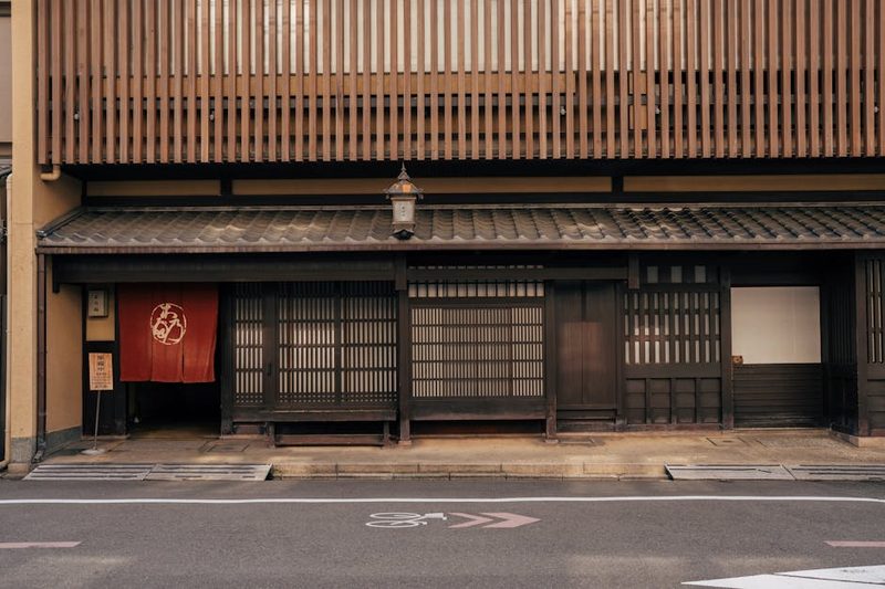 A traditional wooden building facade in Kyoto, Japan, showcasing classic Japanese architecture.