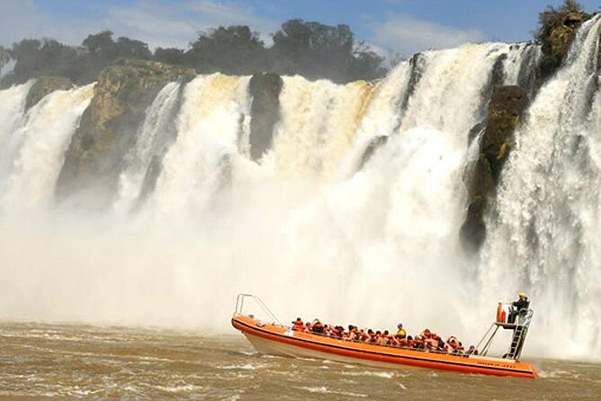 Motorboat under the waterfalls, 4x4 truck in the jungle with Argentine Falls - The Transportation and Logistics