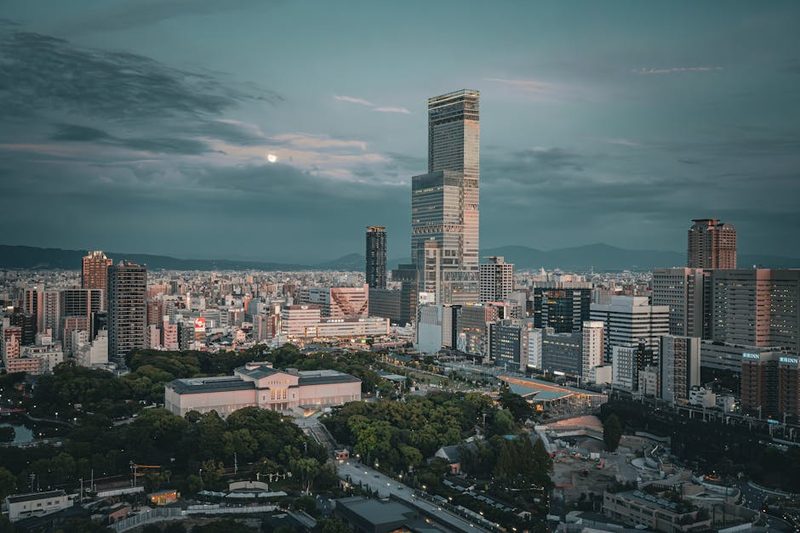 Captivating skyline of Osaka featuring Abeno Harukas at twilight, showcasing Japan's modern architecture.
