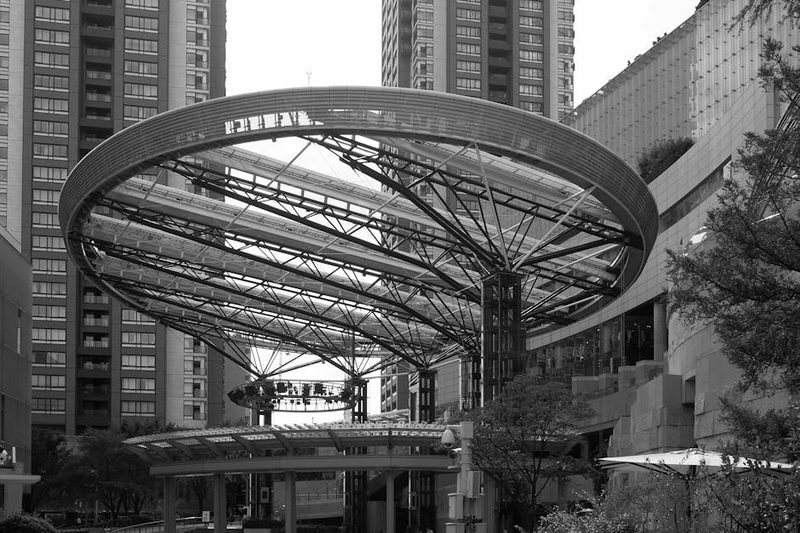 A striking modern structure in the bustling district of Roppongi, Tokyo, Japan