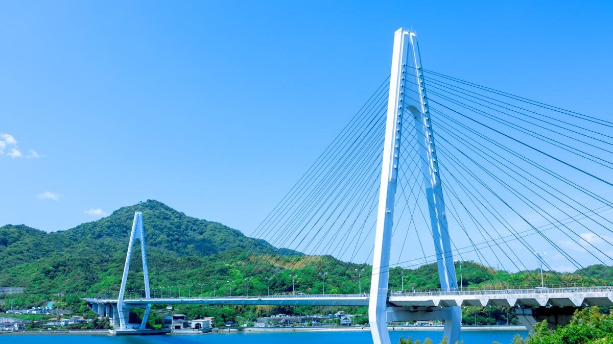 Tatara Bridge cable-stayed bridge rising against a clear blue sky on the Shimanami Kaido