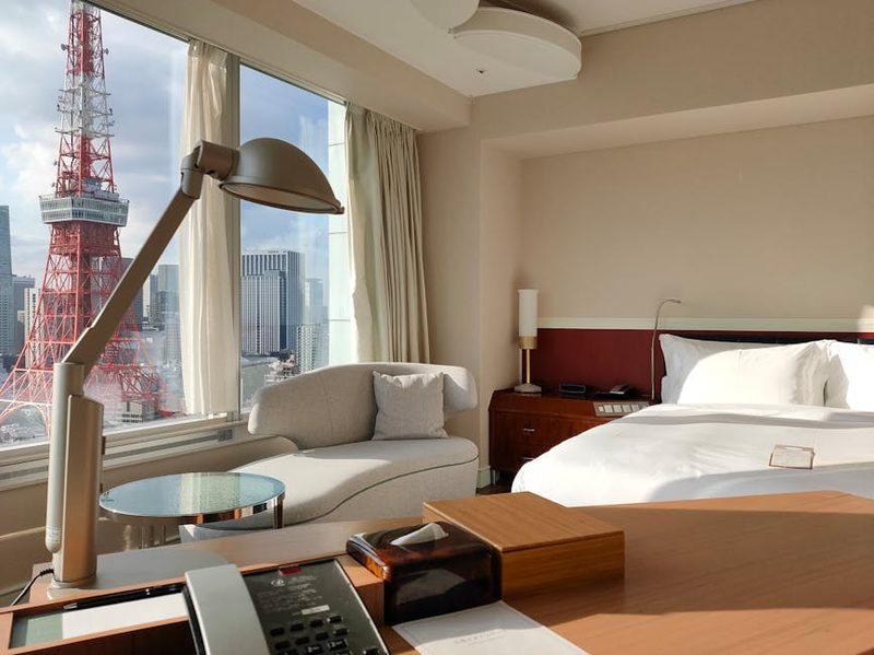 Elegant hotel room in Minato City, Tokyo with a stunning view of the iconic Tokyo Tower.