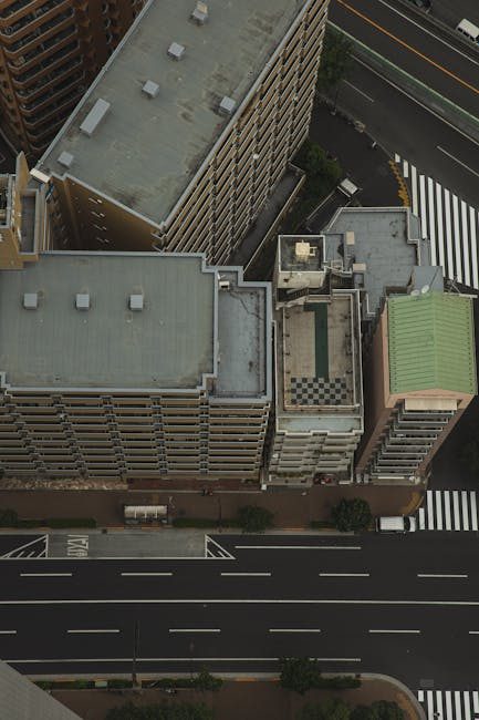 Aerial view of modern urban architecture in Tokyo, showcasing city streets and buildings.