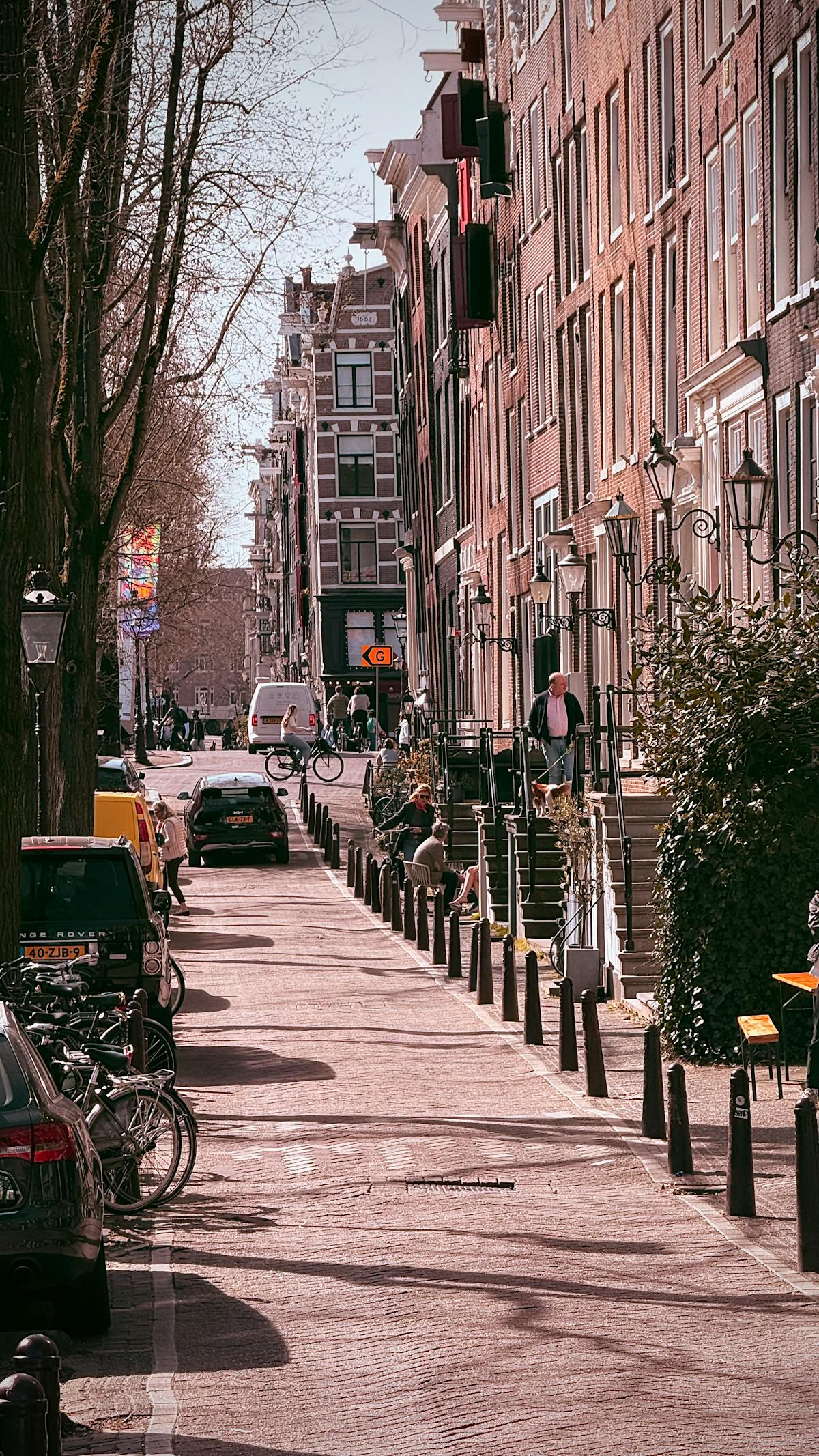 Amsterdam street with bicycles and historic buildings