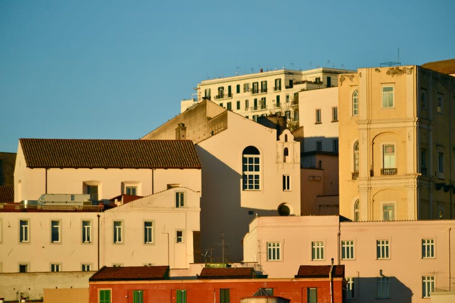 Residential buildings in Naples illuminated by golden evening sunlight