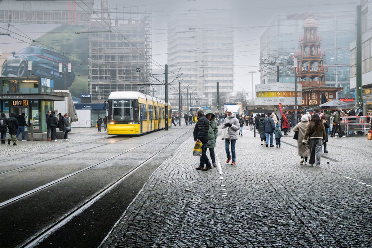 Yellow tram on a Berlin street in winter