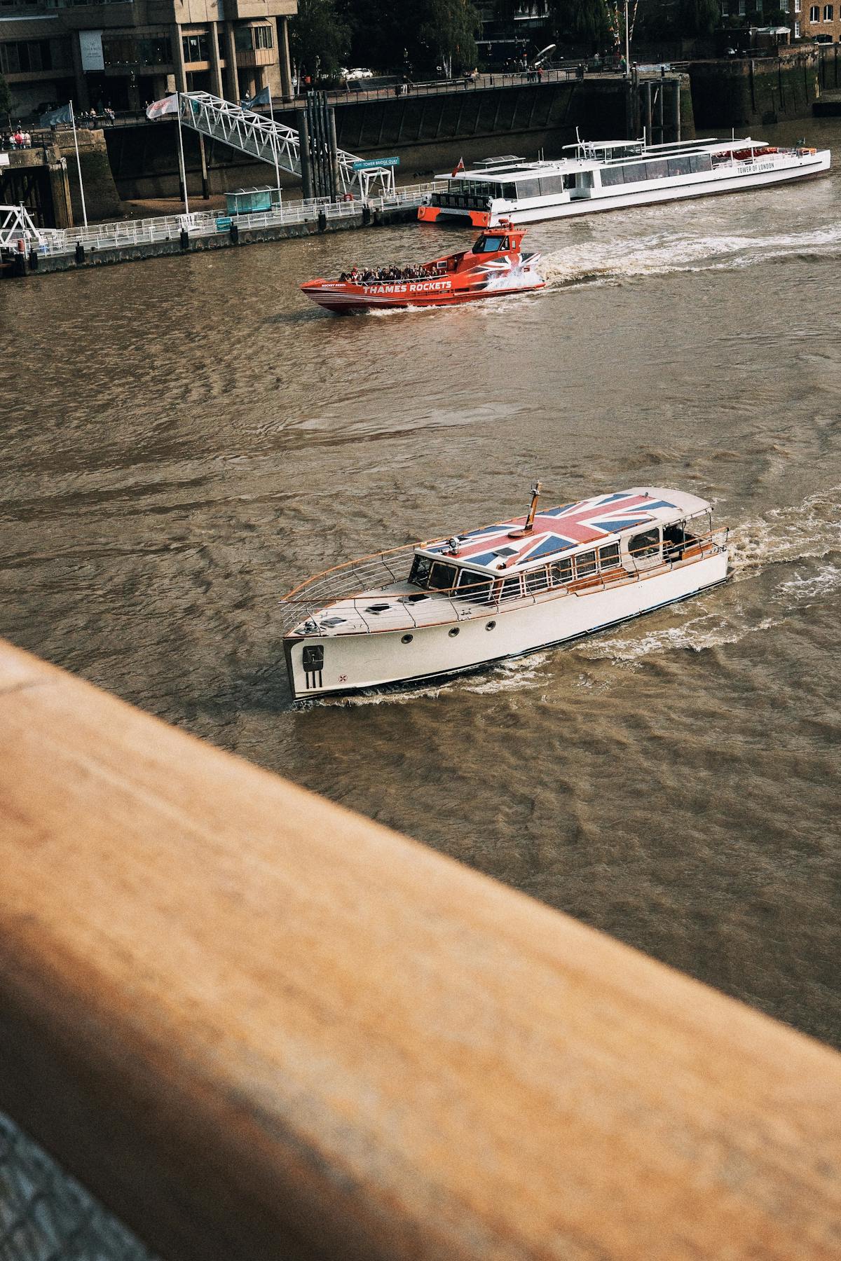 Boats on the Thames with a Union Jack flag visible