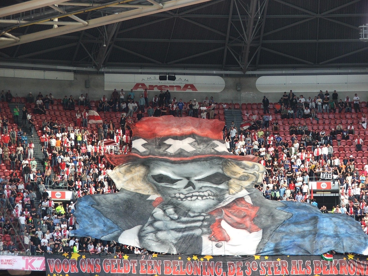 Ajax fans filling the Amsterdam Arena during a football match
