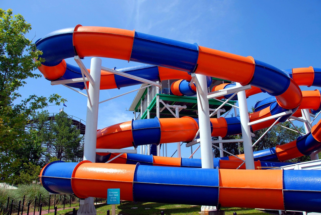 Visitors getting splashed on a water ride at a theme park