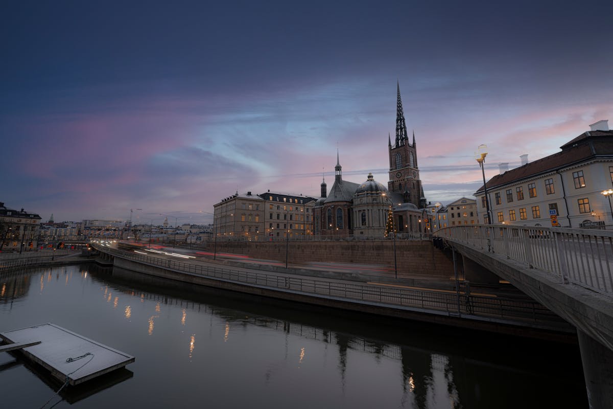 Stockholm skyline reflecting on water at dusk