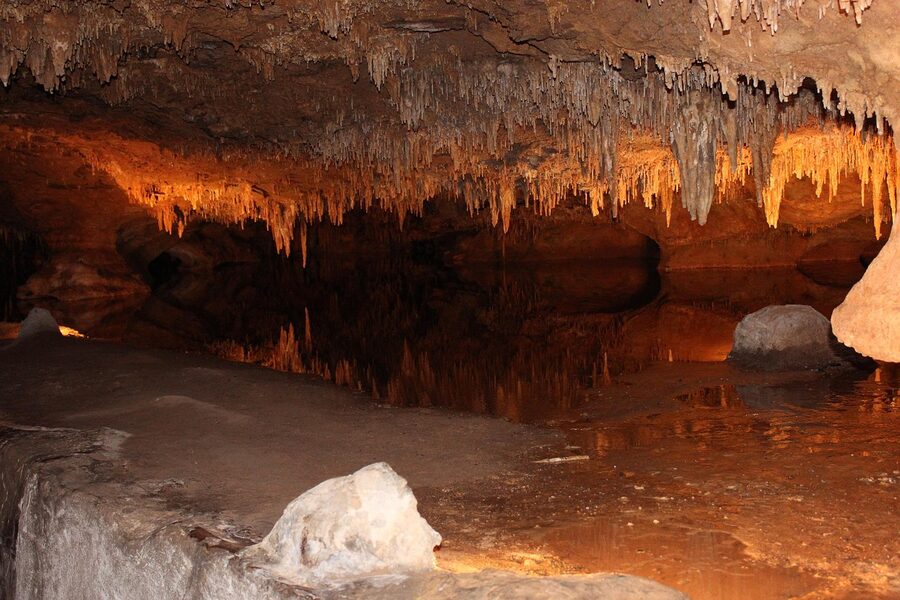 Underground cavern with stalactite formations