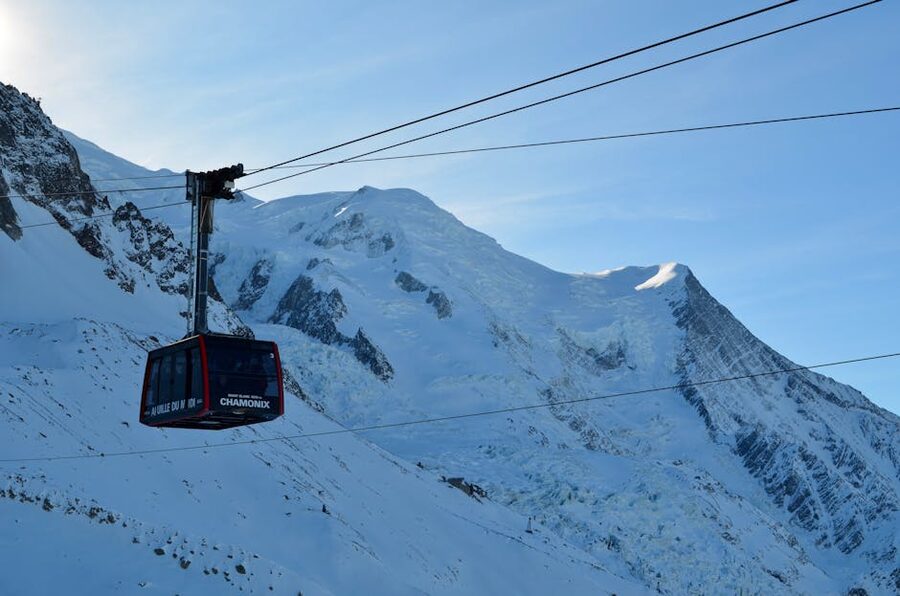 Cable car ascending Aiguille du Midi with Mont Blanc
