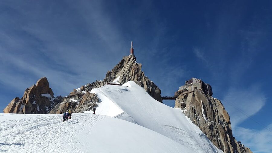 Mountaineers climbing Aiguille du Midi French Alps