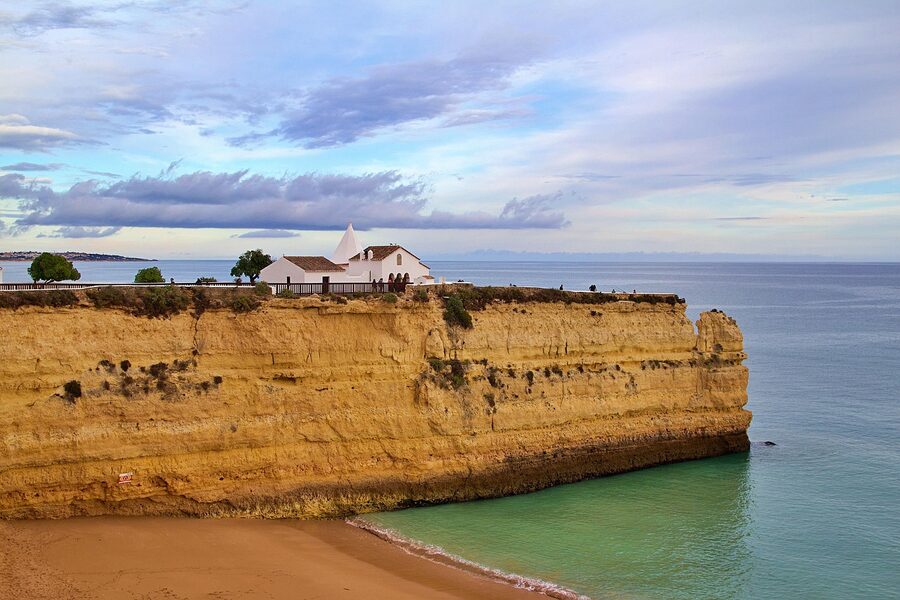 Albufeira old town with historic white buildings on a hillside