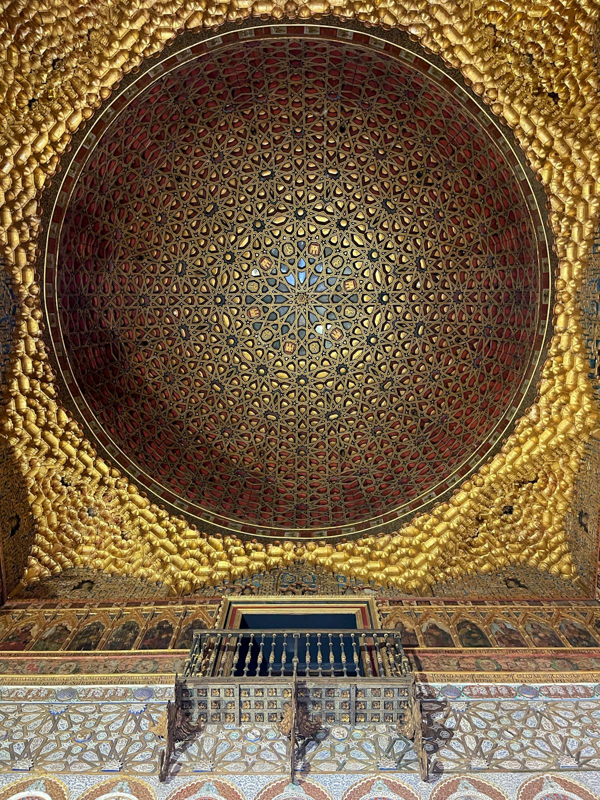 Gilded dome ceiling inside the Hall of Ambassadors at the Alcazar of Seville