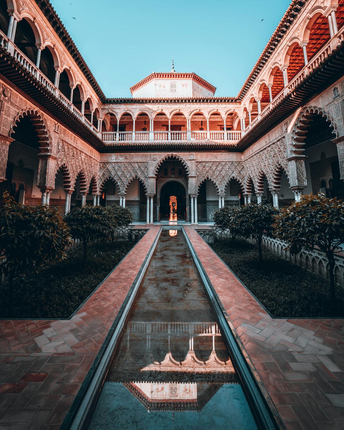 The Maiden Court at the Alcazar of Seville with its reflecting pool