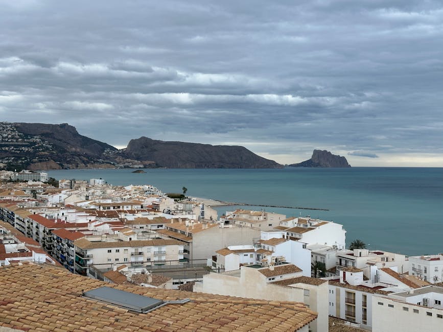 Panoramic view of Altea Spain with white buildings and port