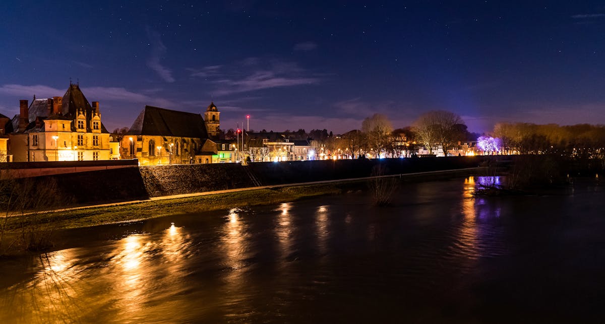 Night view of Amboise with illuminated riverside architecture