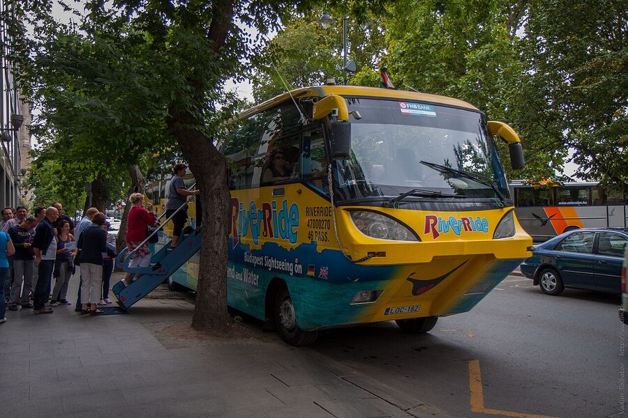 RiverRide amphibious tourist bus on a Budapest street showing the boat hull and bus body