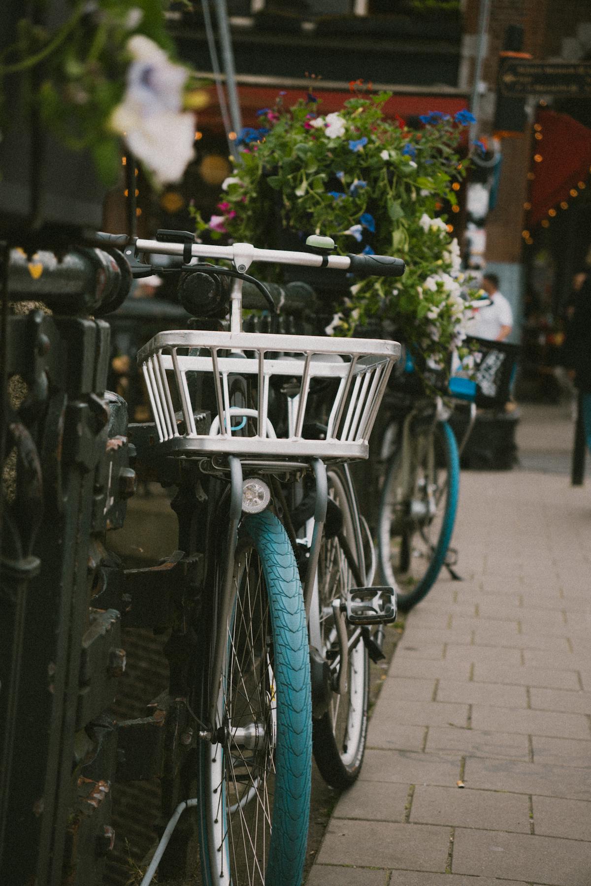 Amsterdam bicycles decorated with colorful flower baskets