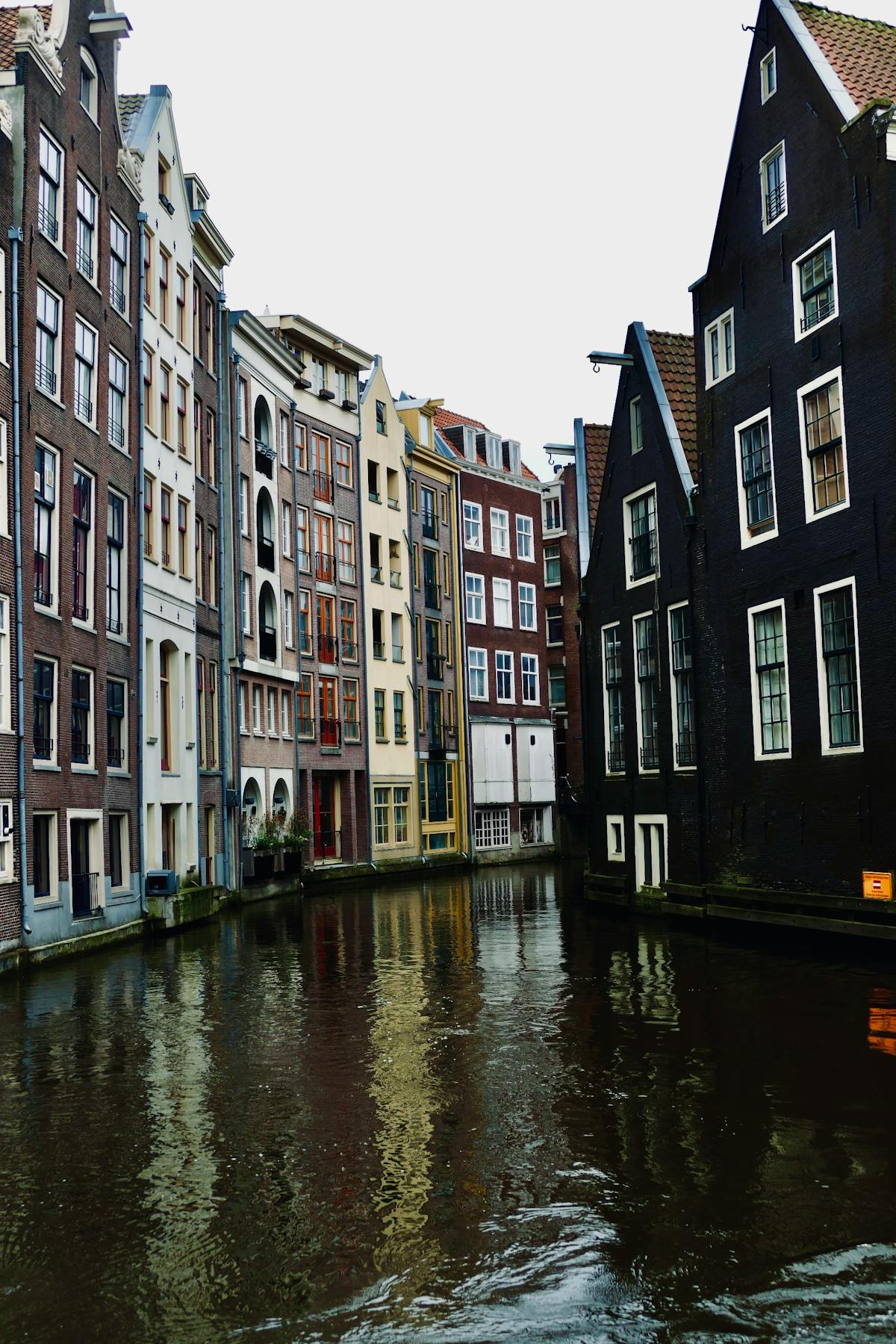 Picturesque traditional canal houses along Amsterdam canal