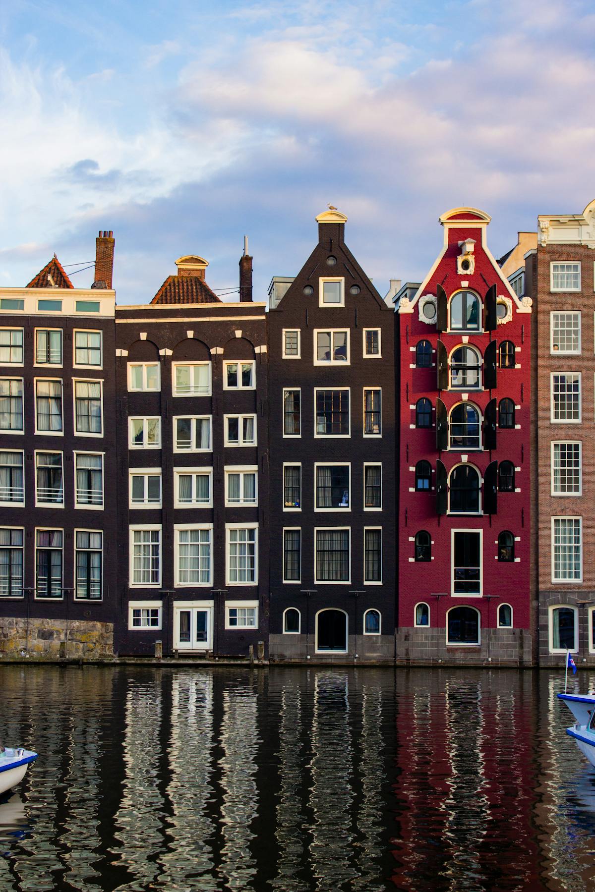 Traditional Amsterdam canal houses at sunset