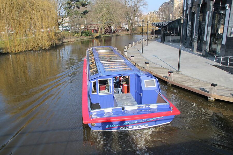 Glass roof canal cruise boat Amsterdam