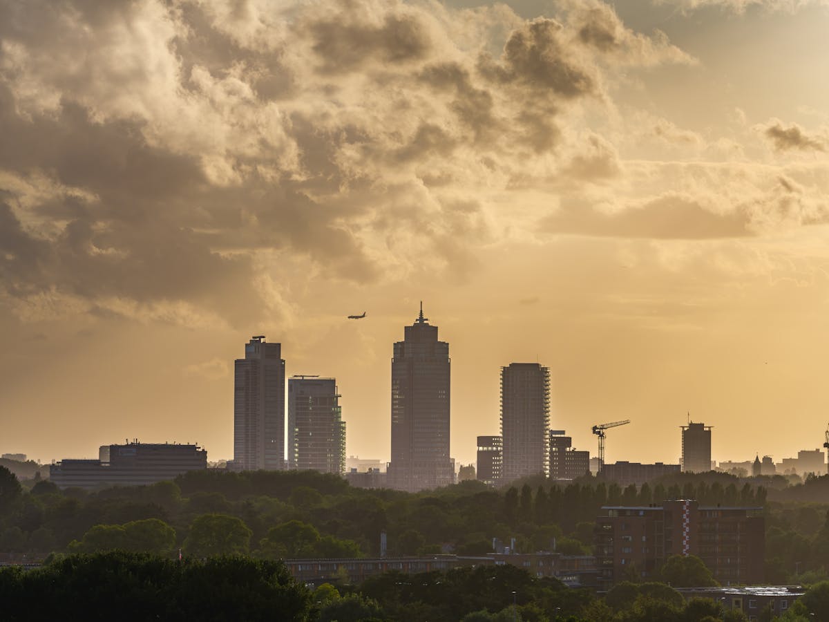 Wide view of Amsterdam harbor and skyline