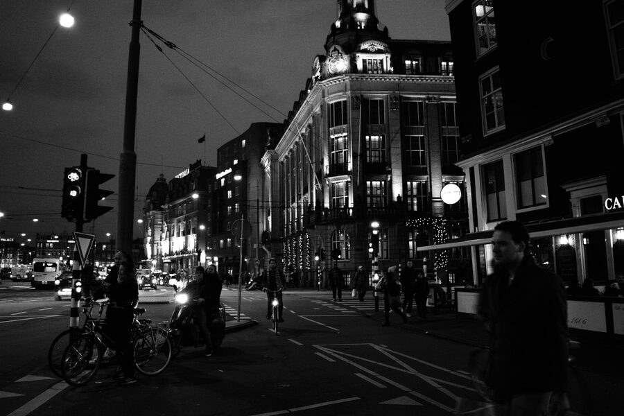 Amsterdam canal house at night with red light