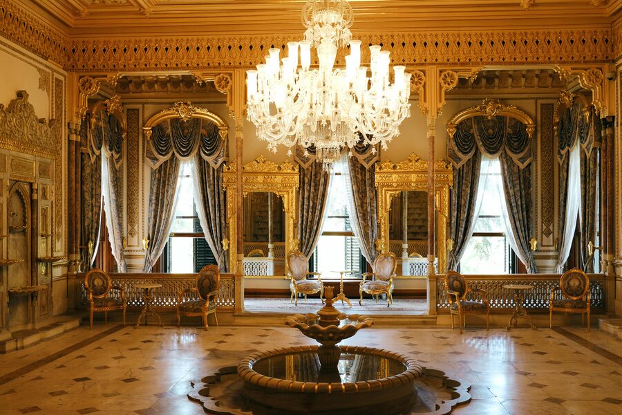 Ornate palace interior with chandeliers