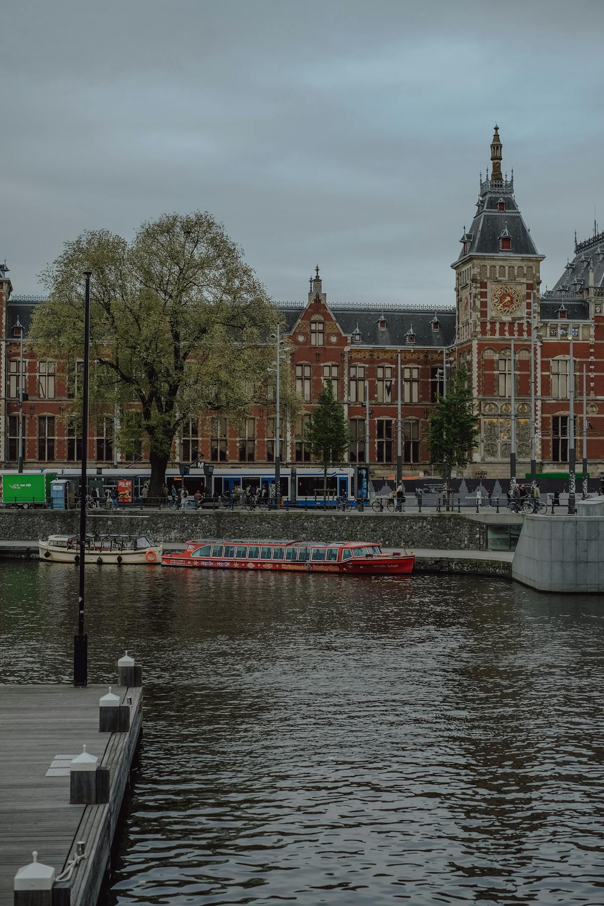 Amsterdam waterfront with boats and buildings along the IJ