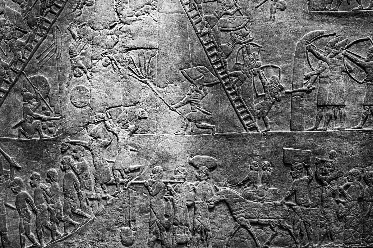 Ancient stone tablet with carved symbols