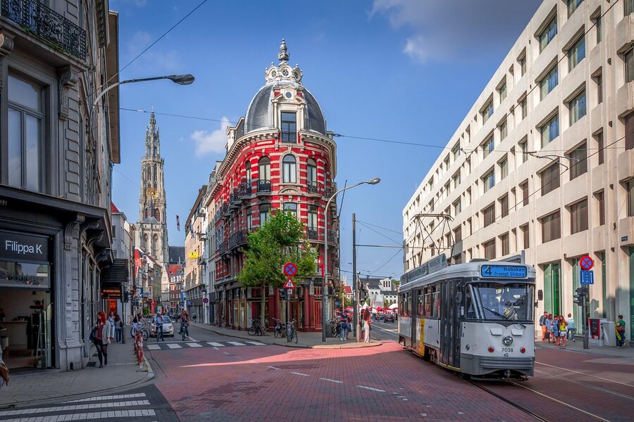 Antwerp cityscape with tram and cathedral spire