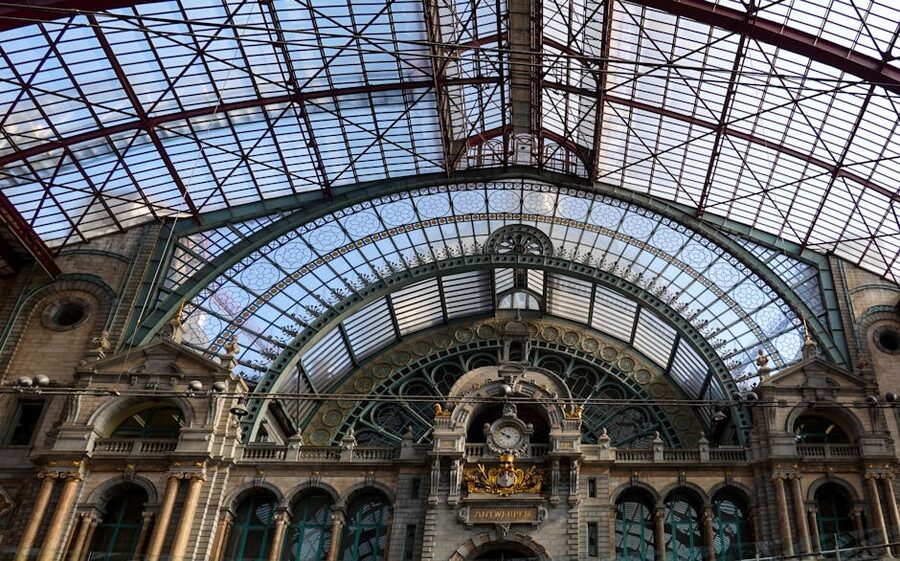 Antwerp Central Station clock and glass ceiling interior