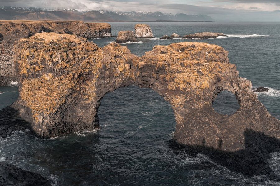 Natural basalt arch formation at Arnarstapi Iceland