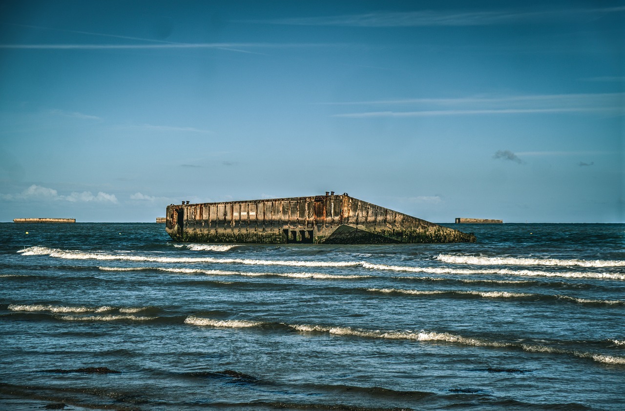 The beach at Arromanches-les-Bains showing remnants of the WWII Mulberry artificial harbour